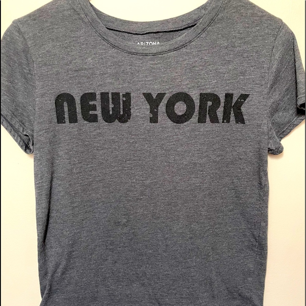 New York word logo > grey size: small . Fits to skin . Like new .
